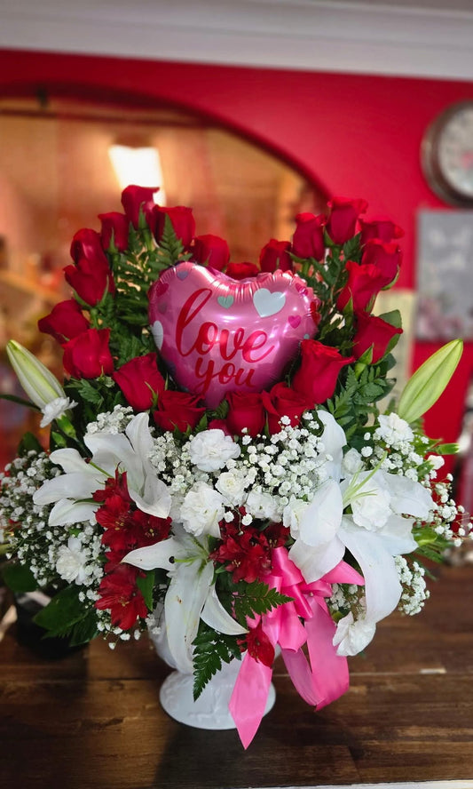 Heart-Style Arrangement With White and Red Roses